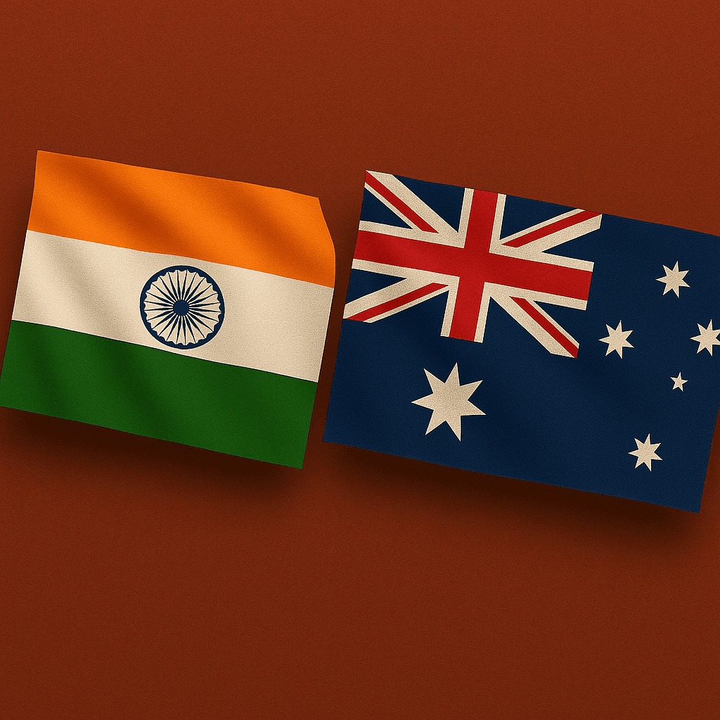 Side-by-side view of the Indian and Australian national flags on a rust-colored background, representing diplomatic relations and partnership