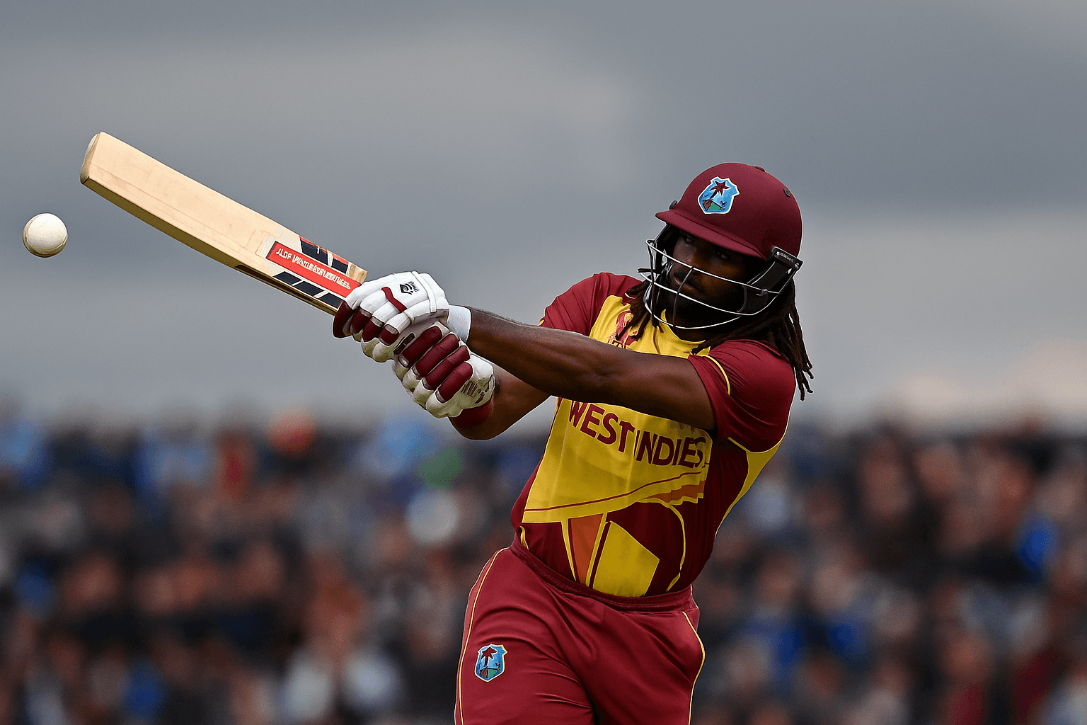 Hetmyer playing cover drive under overcast sky