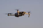 Villagers pointing at drones flying over Bihar-Nepal border"