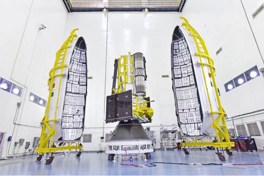 Engineers wrapping the NISAR satellite in its protective fairing at ISRO’s Satish Dhawan Space Centre for the India US space mission launch